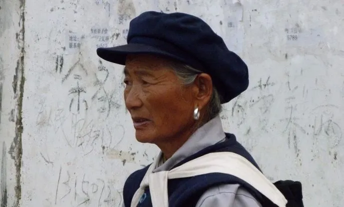 lijiang naxi vrouw dimsum china reizen